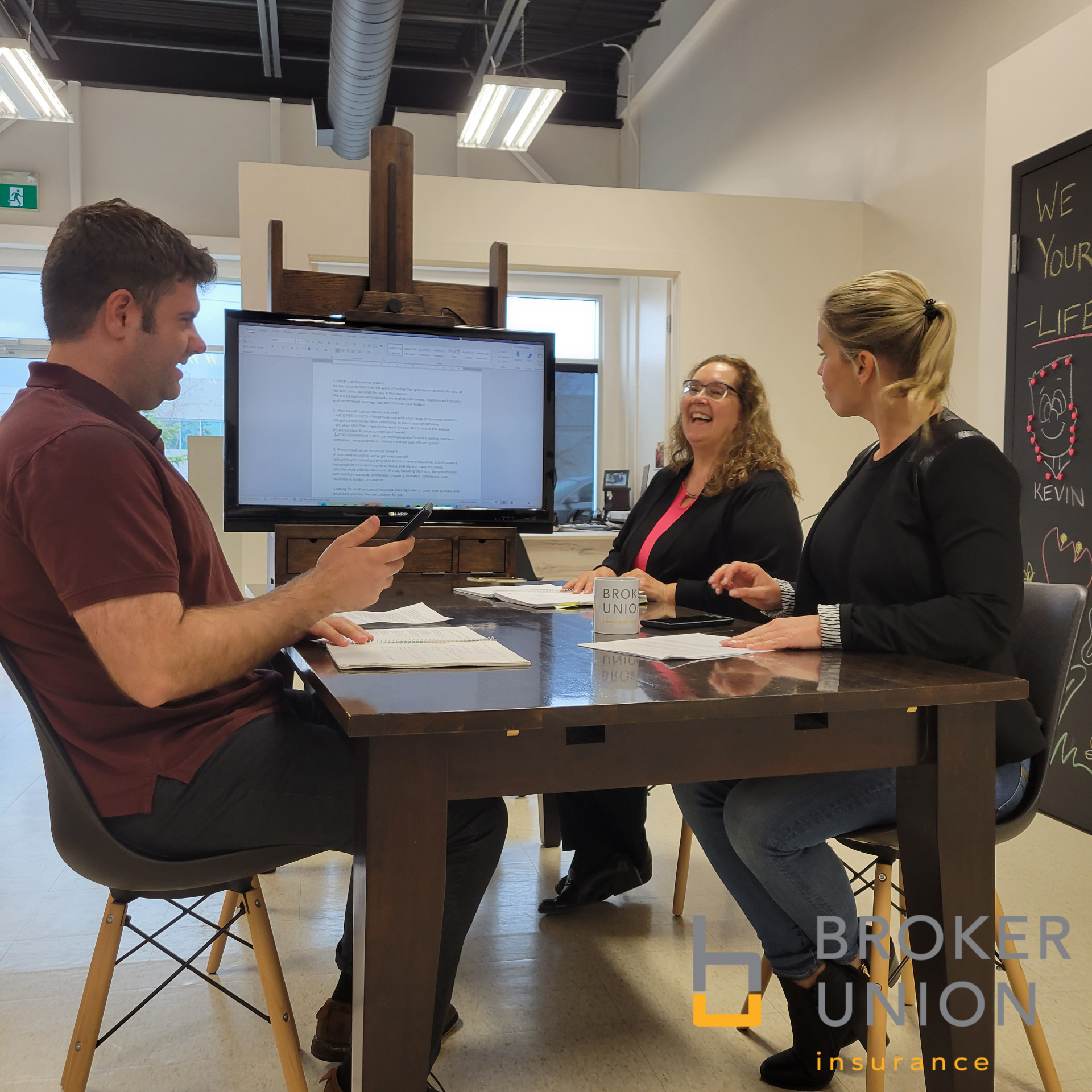 BrokerUnion brokers collaborating around the office table
